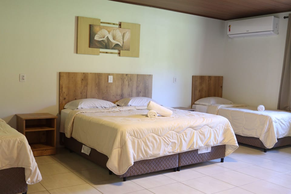 Deluxe Quadruple Room | Blackout drapes, free WiFi, bed sheets