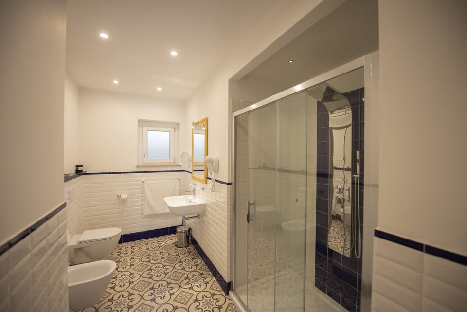 Free toiletries, hair dryer, slippers, bidet