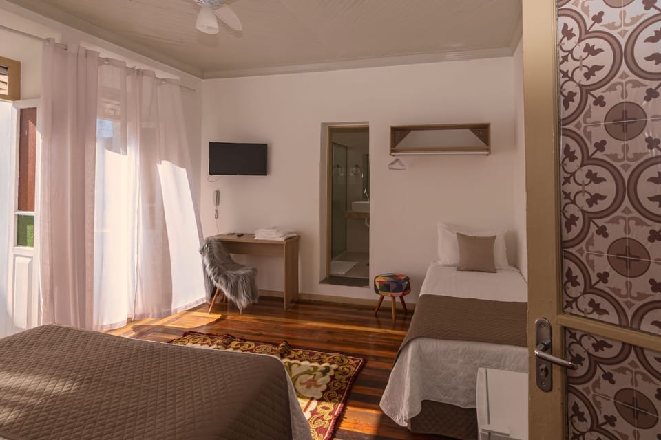 Desk, laptop workspace, free WiFi, bed sheets