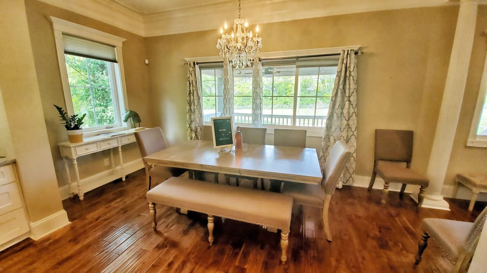 Dining Table with Additional Bar Top Seating and Outdoor Patio Seating