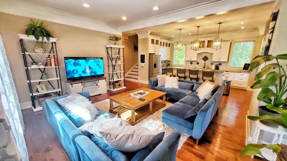 Wide Open Living Area Includes Giant Sectional, Kitchen, Bar Top & Dining Area