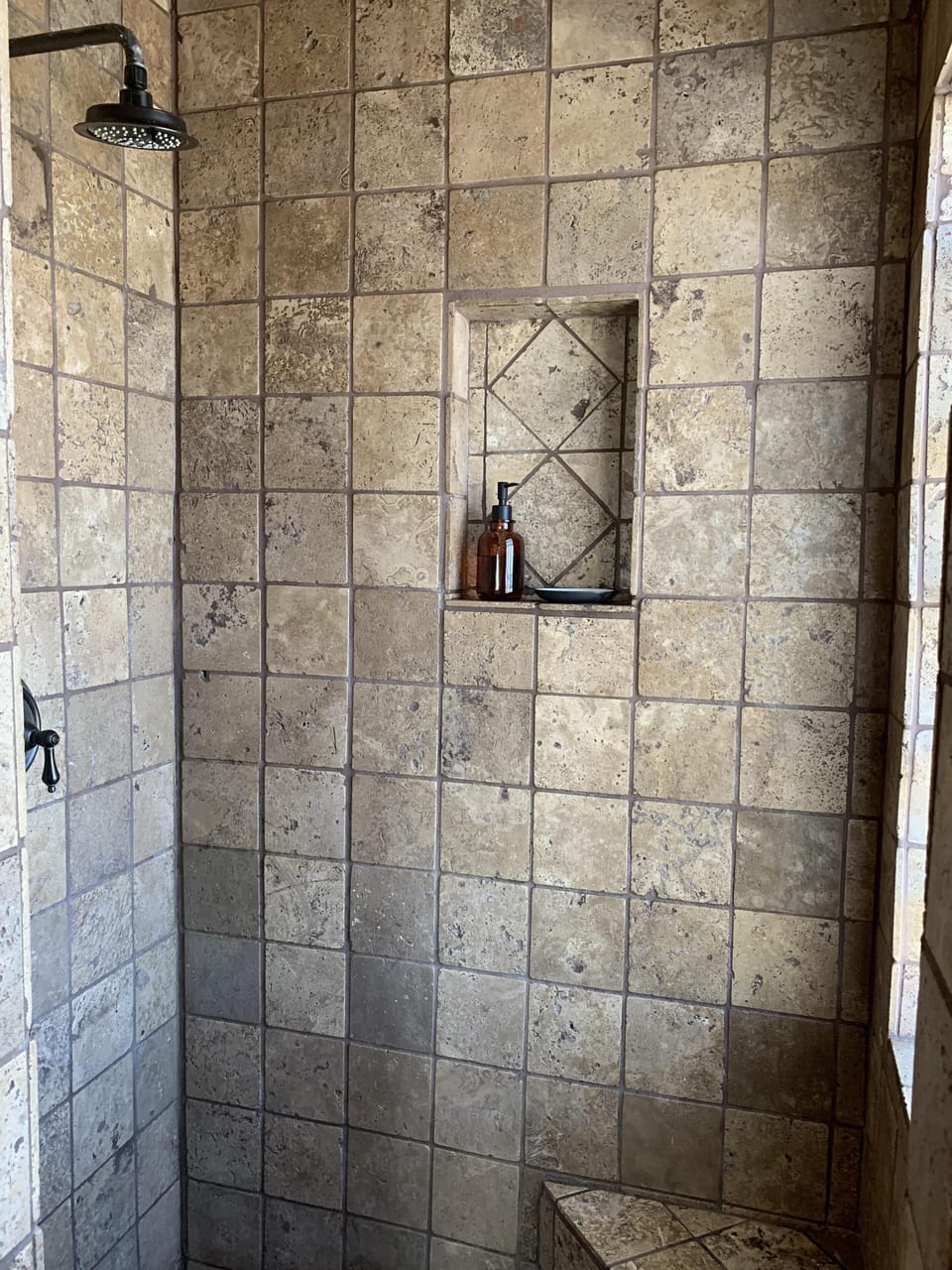 Natural stone in upstairs private shower