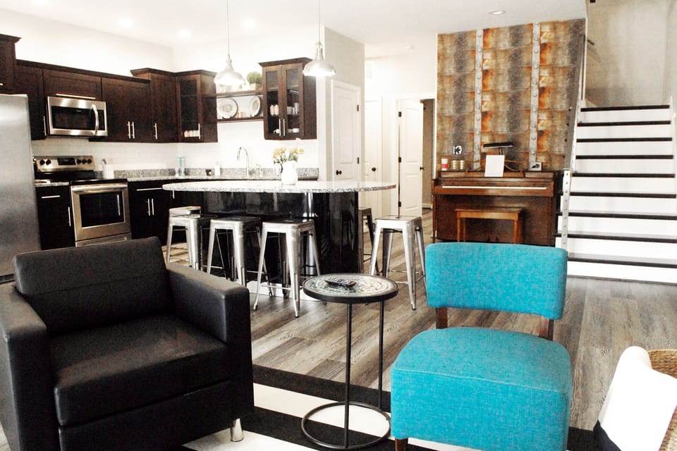 Open plan first floor living room, dining room and kitchen