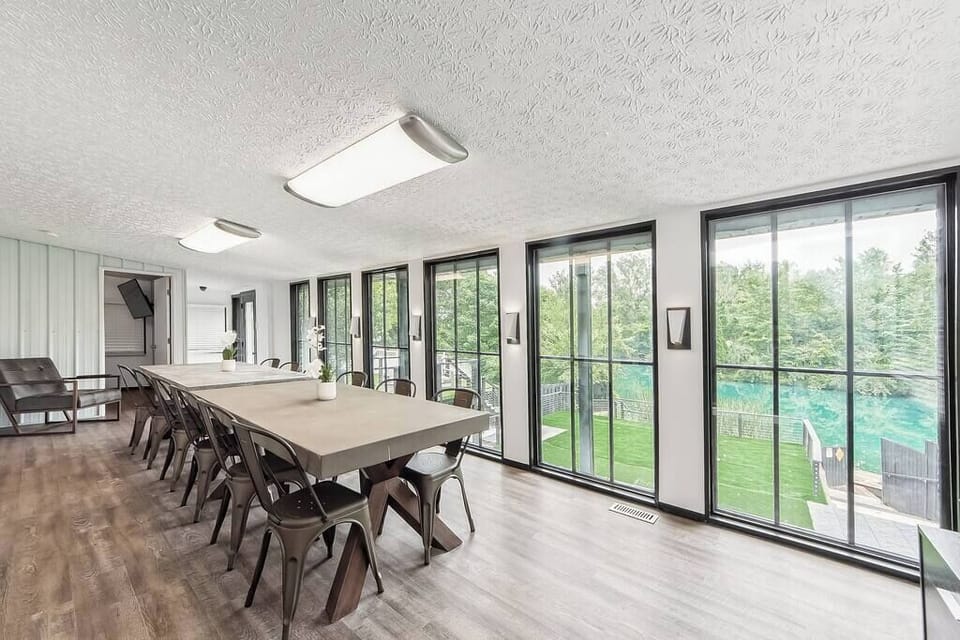 Dine overlooking your private terrace and pond.