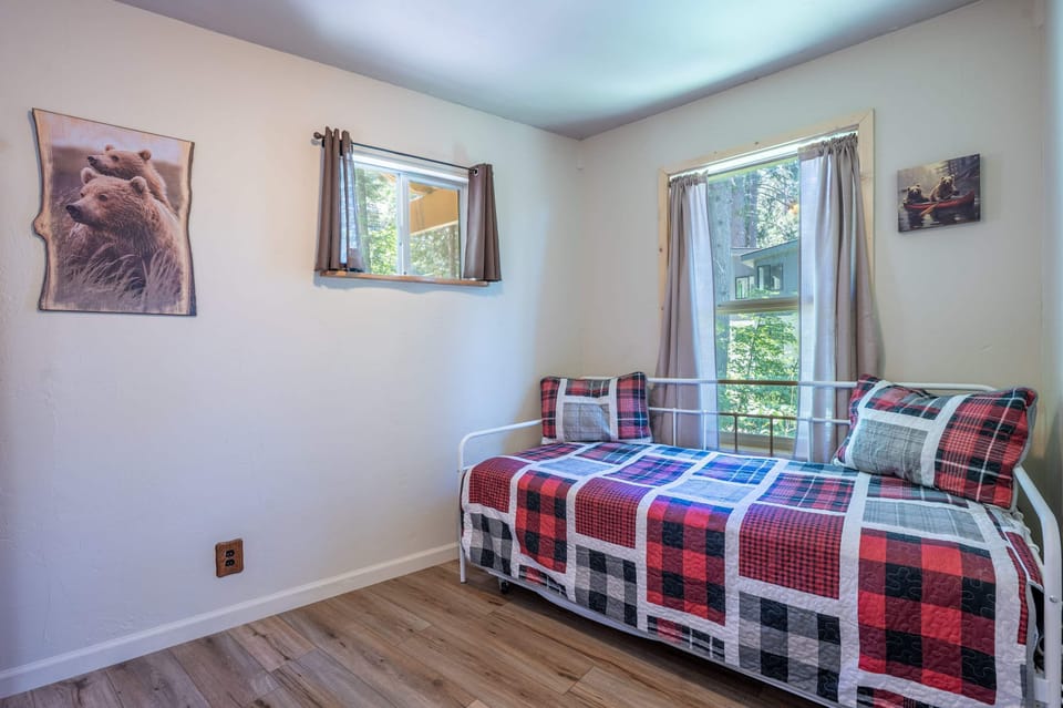 Den with two twin beds