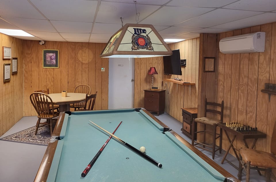 Game Room with pool, darts, chess/checkers, and various board games!