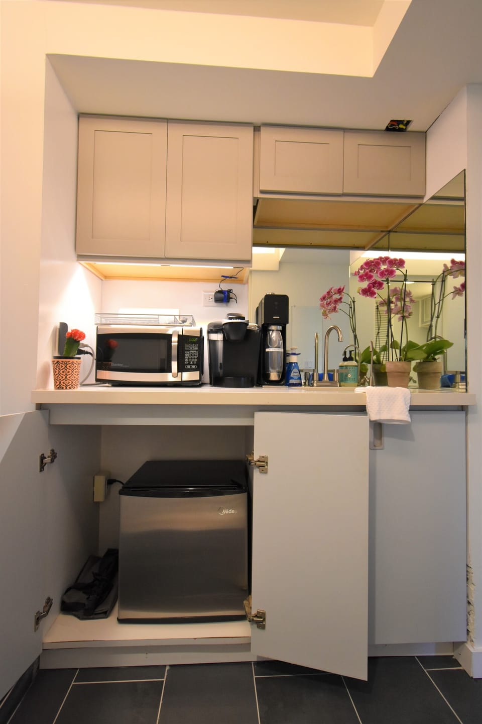 Well stocked cabinets and fridge/freezer