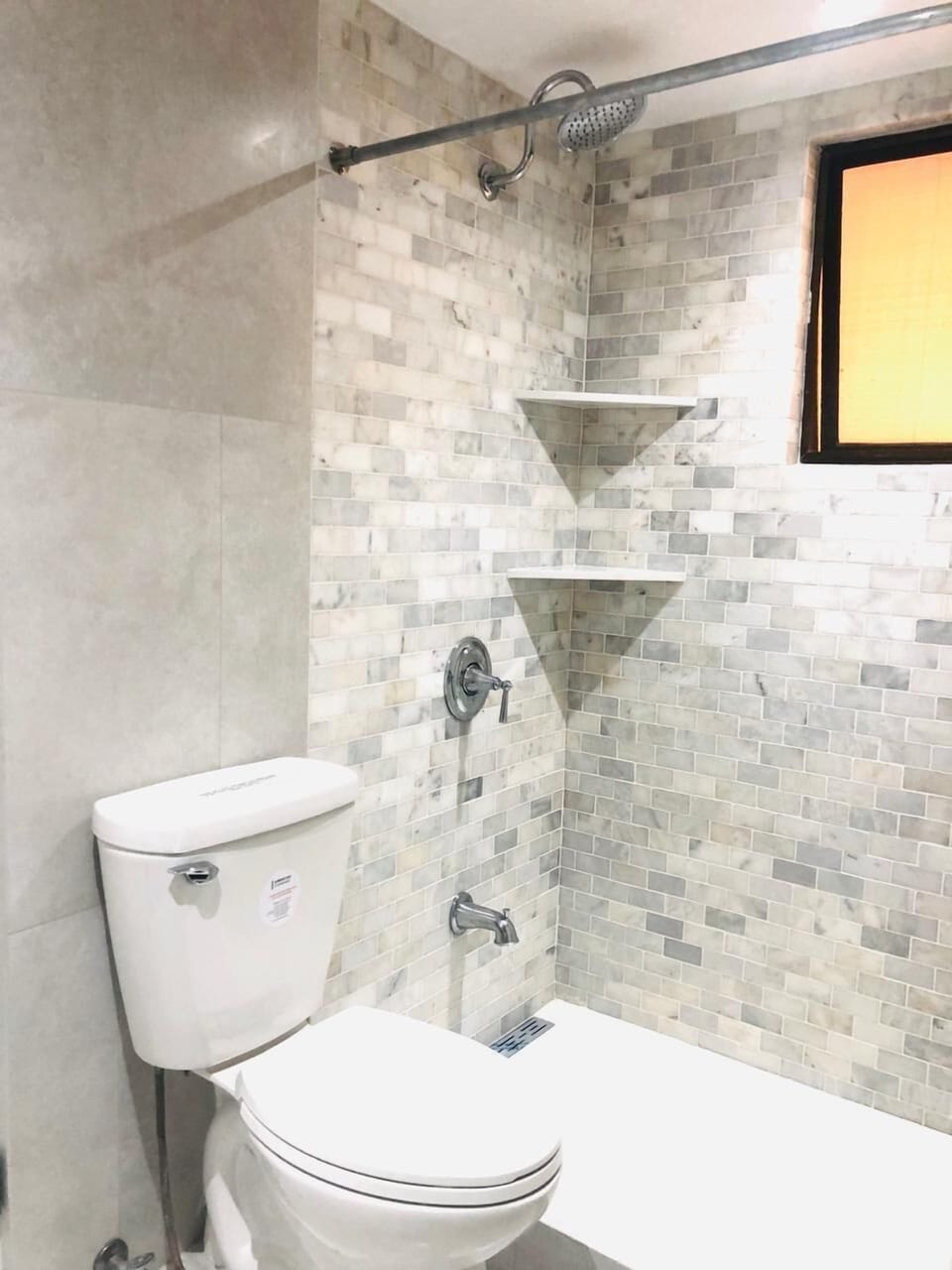 Full bath #1 marble and tile shower