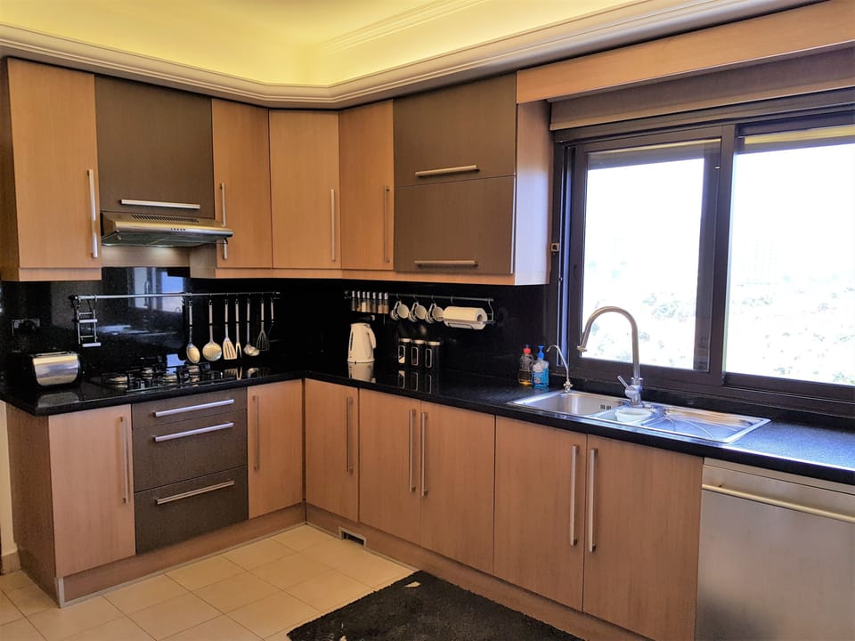 Apartment, 2 Bedrooms | Private kitchen | Full-size fridge, microwave, oven, stovetop