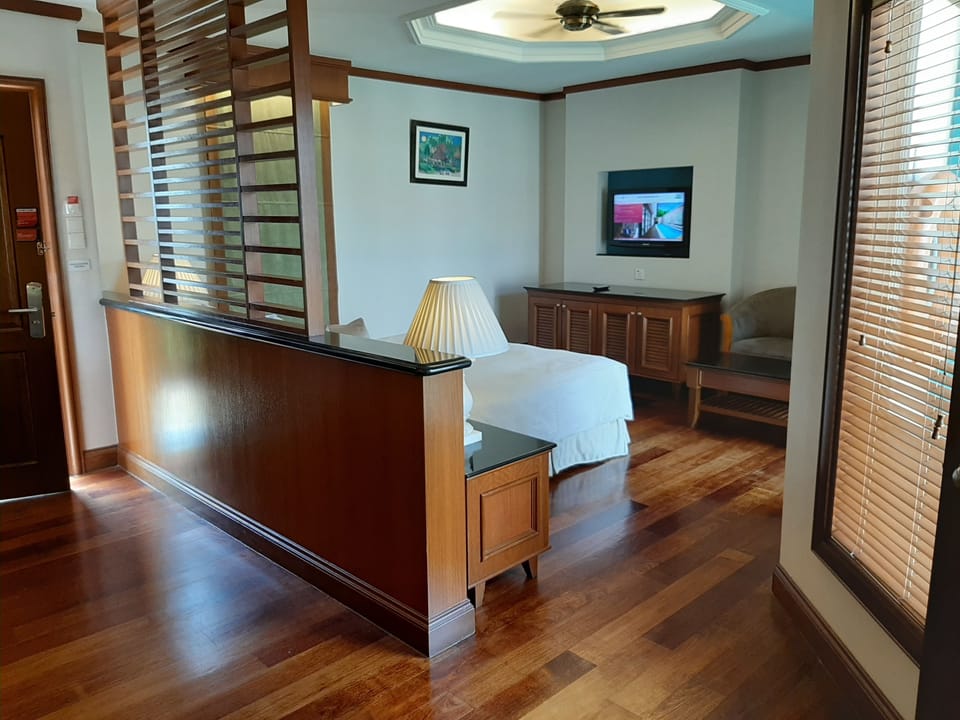 Deluxe Pool Villa | Minibar, desk, laptop workspace, blackout drapes