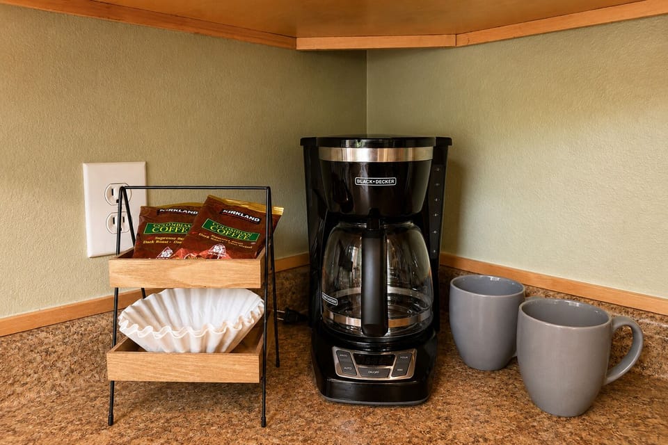 Start your morning right with freshly brewed coffee from your own in-room coffee maker, complete with mugs and premium coffee packets.