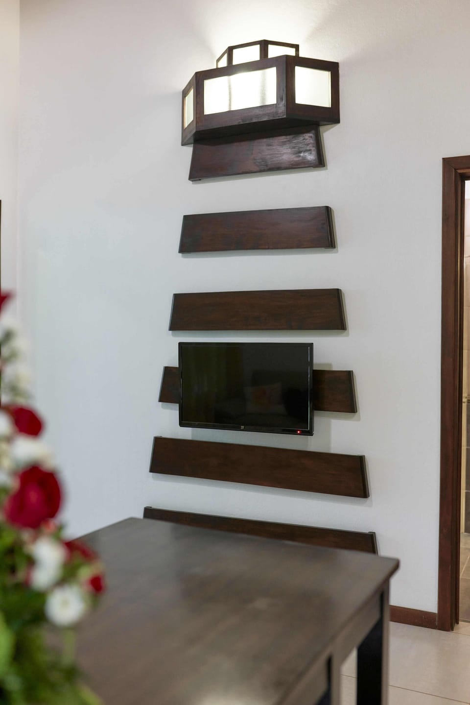 Luxury Apartment | Living area | 32-inch Smart TV with satellite channels, TV