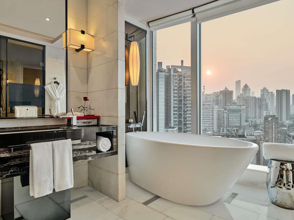 Separate tub and shower, deep soaking tub, rainfall showerhead