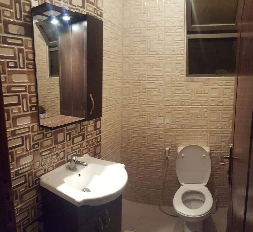 Small Bathroom Near the Entrance Door.