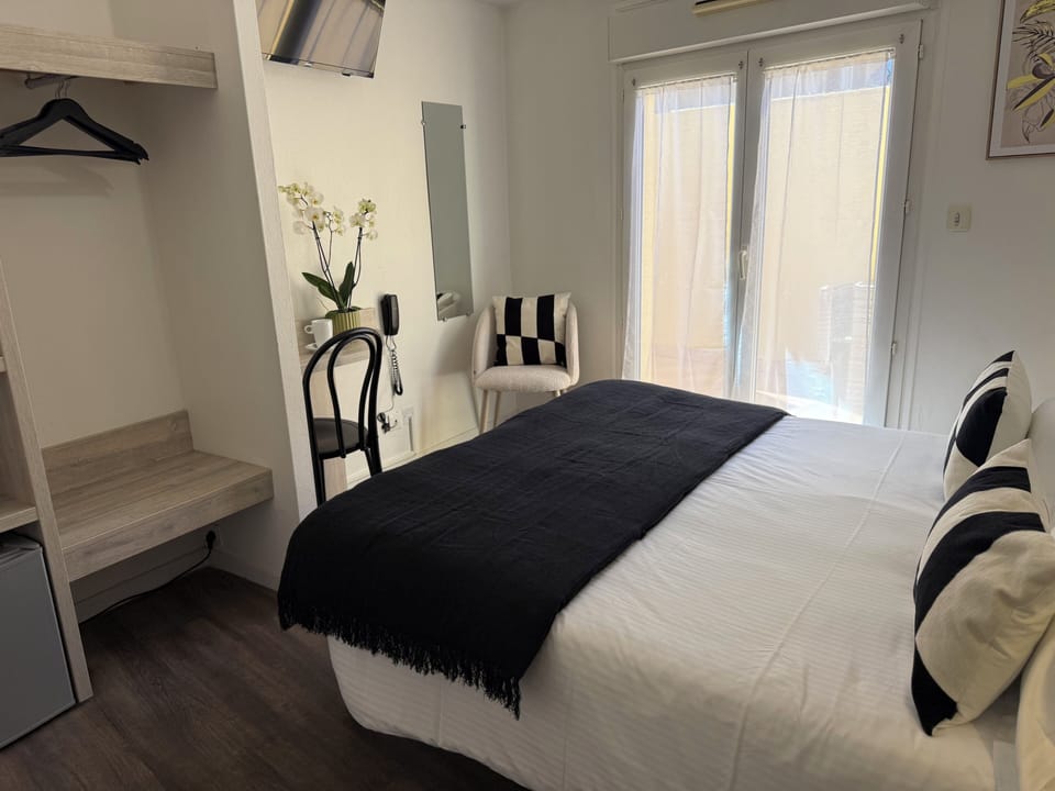 Comfort Room | In-room safe, individually furnished, desk, blackout drapes