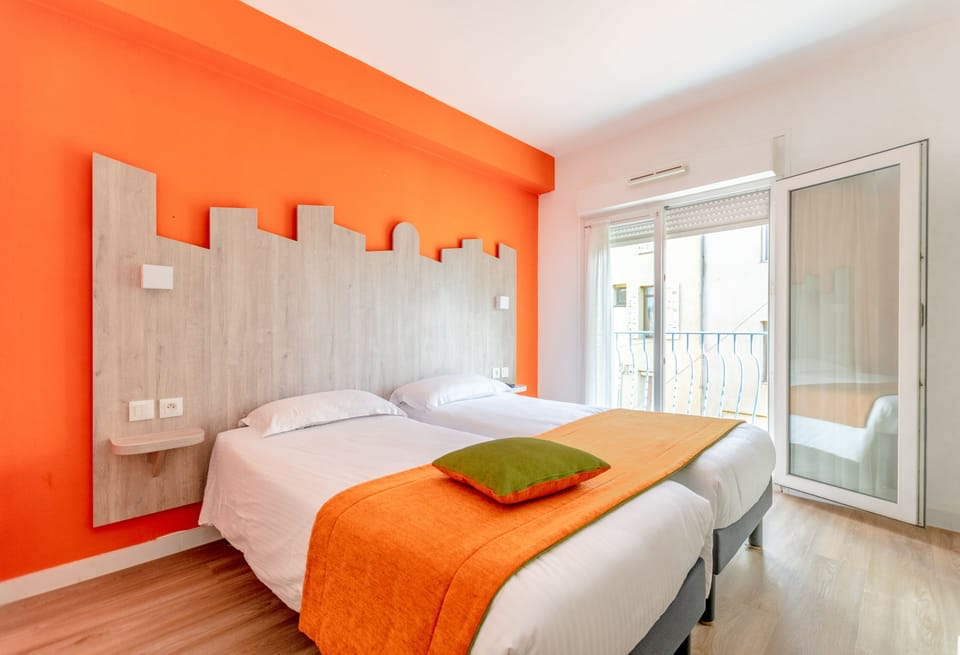 Comfort Room | In-room safe, individually furnished, desk, blackout drapes