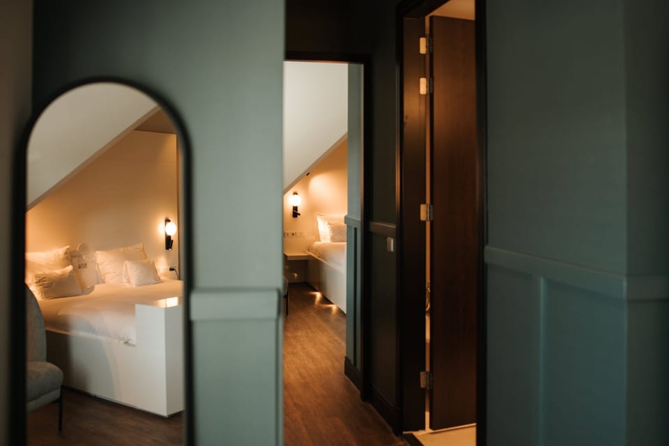 Family Suite, 2 Bedrooms | Living area | 26-inch Smart TV with satellite channels, TV, Netflix