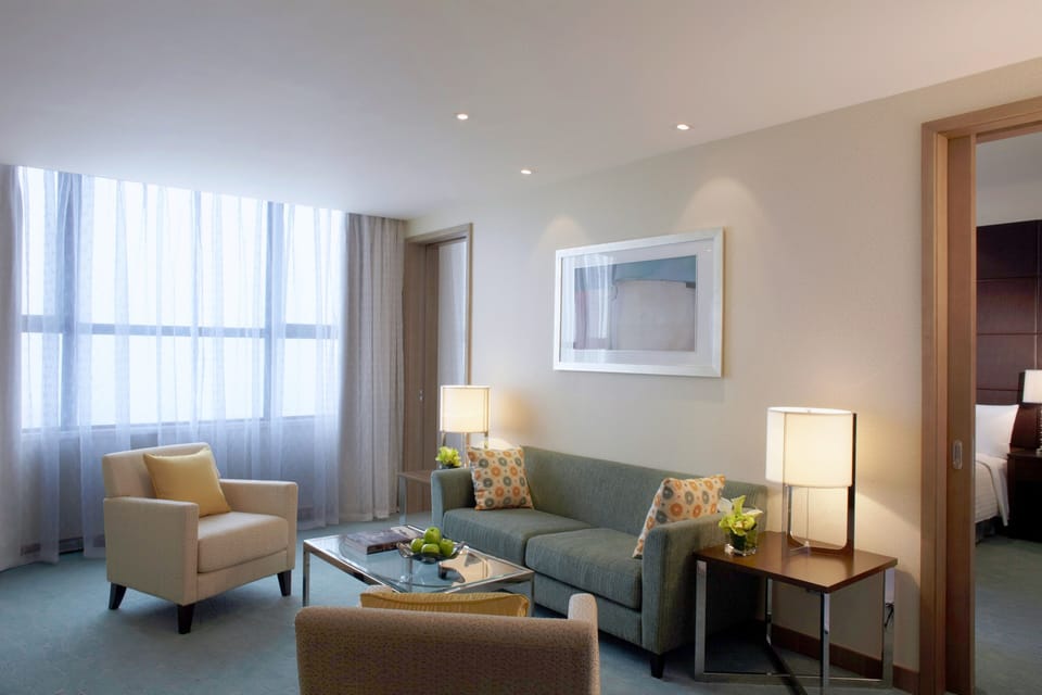 Executive Suite, 1 Double Bed | Living room | 49-inch TV with satellite channels