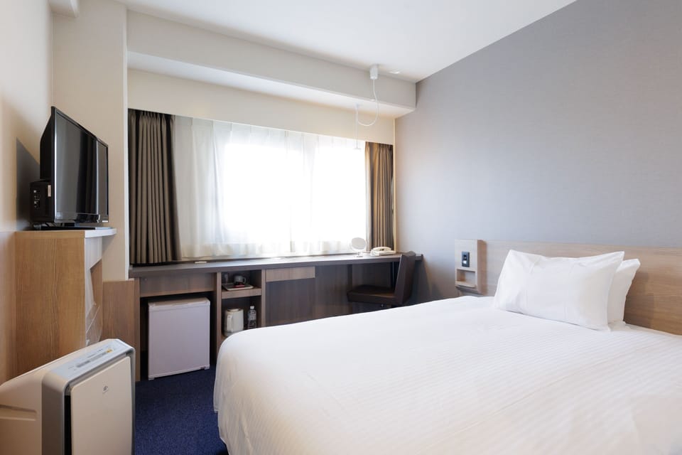 Premium bedding, desk, blackout drapes, iron/ironing board