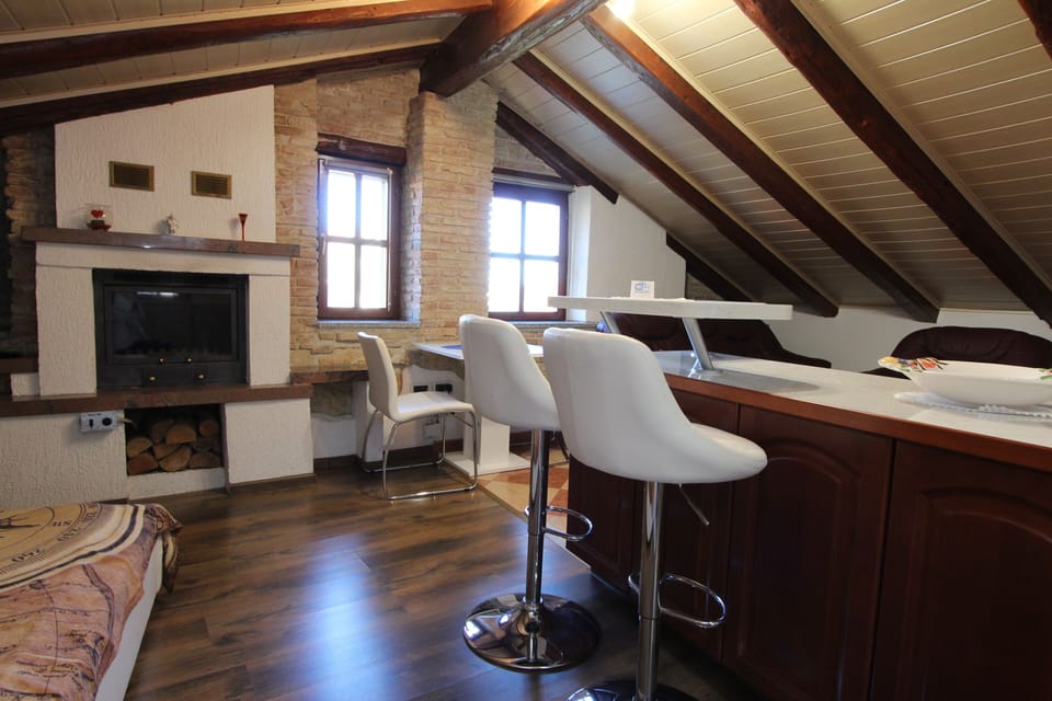 Studio | Living area | Flat-screen TV, fireplace