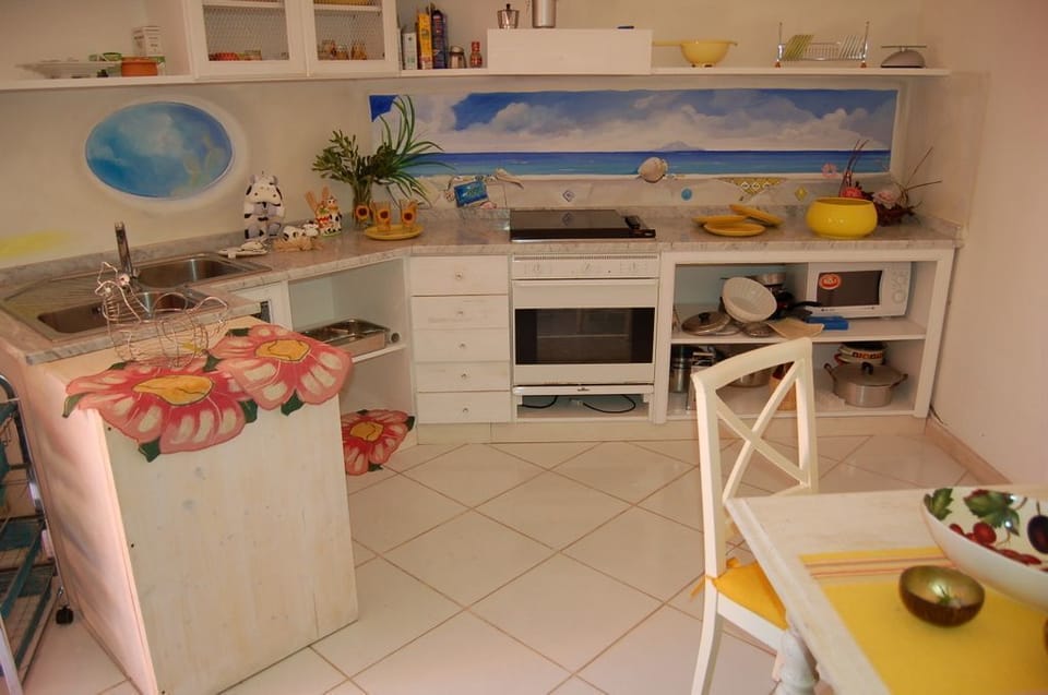 Apartment, 2 Bedrooms | Private kitchen | Fridge, stovetop, dishwasher, cookware/dishes/utensils