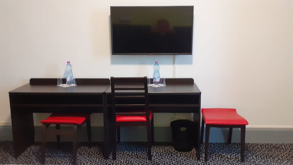 Desk, blackout drapes, iron/ironing board, free WiFi