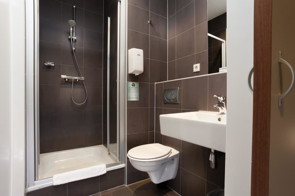 Shower, free toiletries, hair dryer, towels