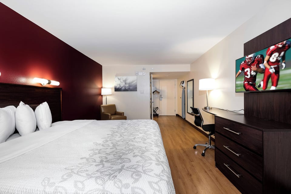 Desk, laptop workspace, blackout drapes, cribs (free)
