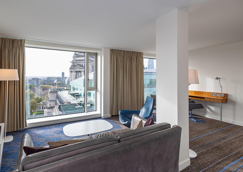 City Suite, 1 King Bed with Sofa bed, Non Smoking | Living area | 49-inch TV with cable channels, DVD player