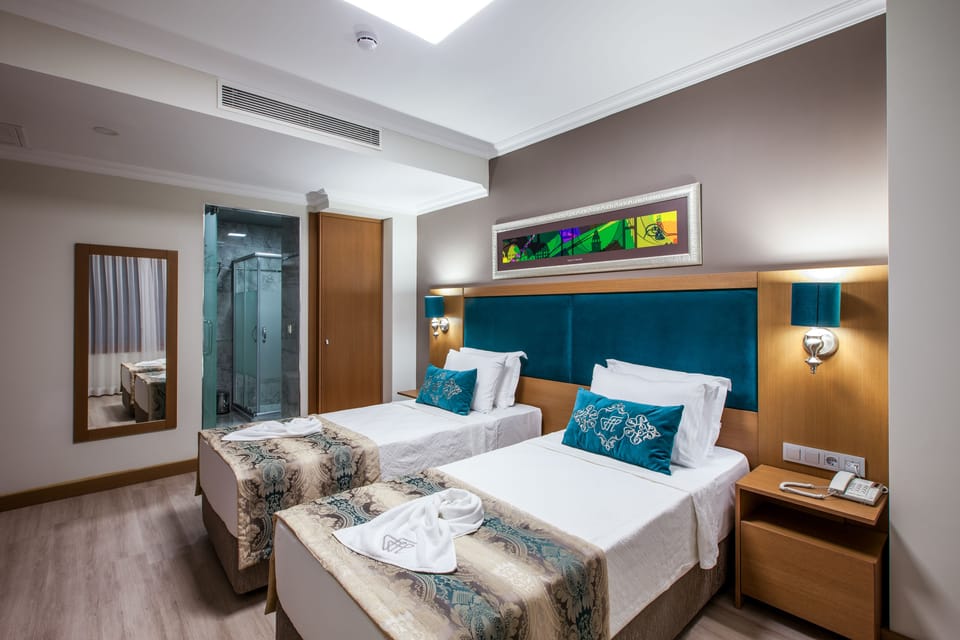 Deluxe Triple Room | Egyptian cotton sheets, premium bedding, down comforters, pillowtop beds