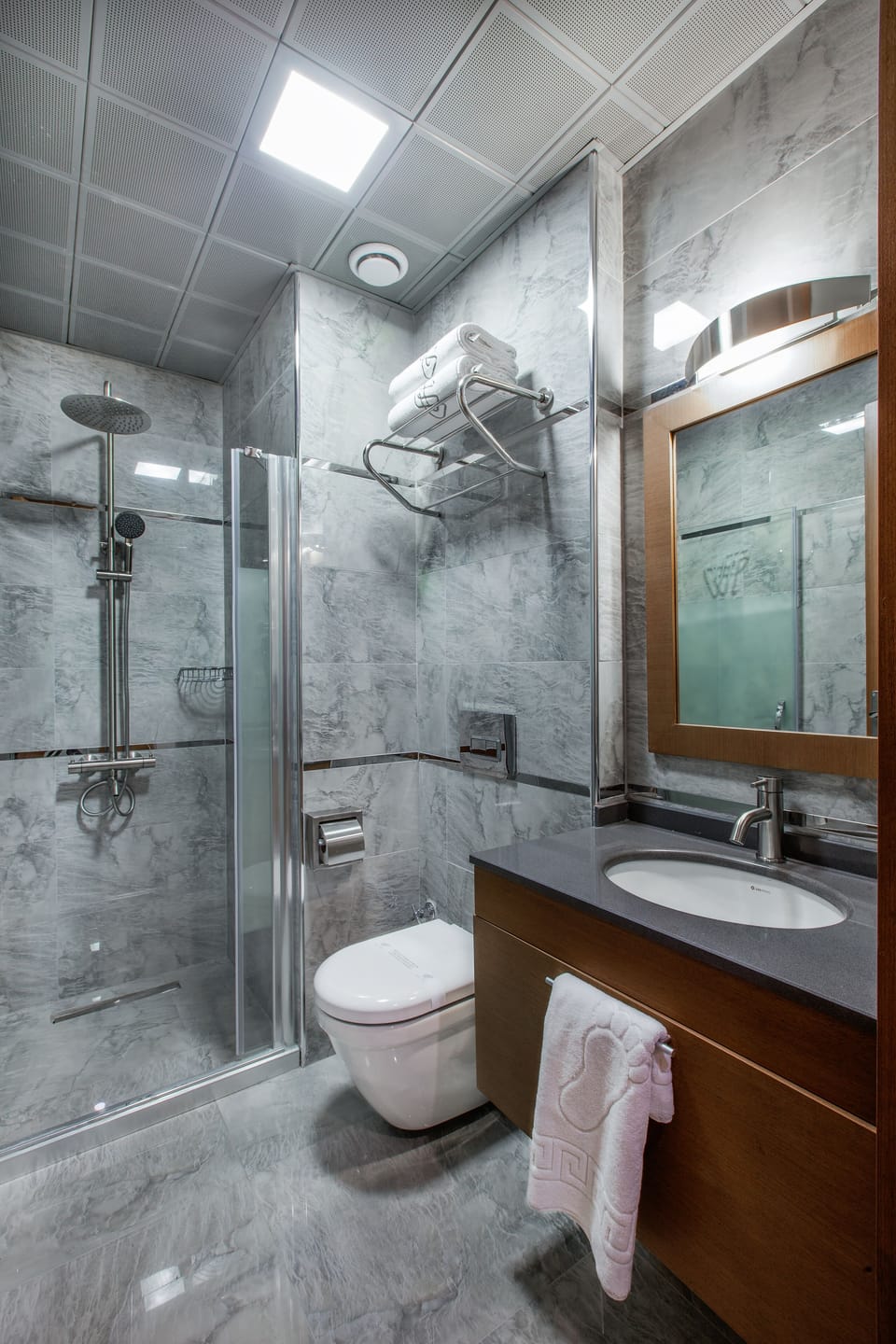 Shower, free toiletries, hair dryer, slippers