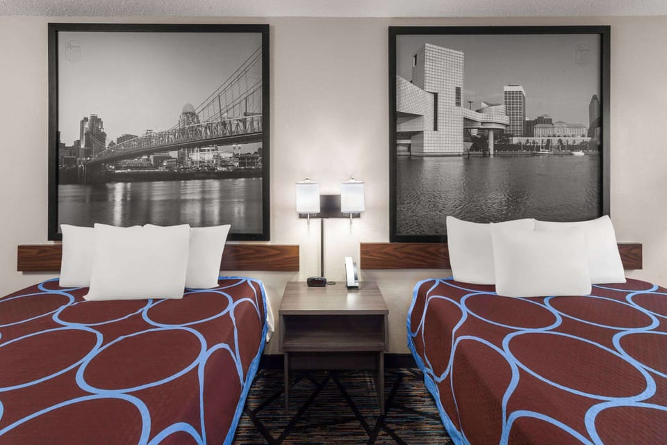 Room, 2 Queen Beds, Non Smoking | In-room safe, blackout drapes, iron/ironing board, cribs/infant beds