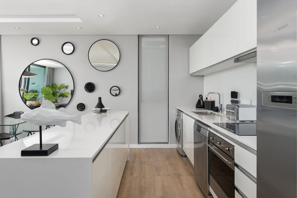 Luxury Apartment | Private kitchen | Full-size fridge, microwave, oven, stovetop