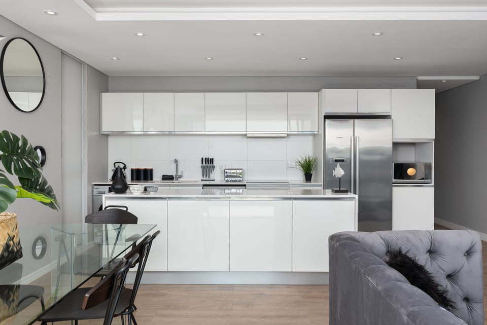 Luxury Apartment | Private kitchen | Full-size fridge, microwave, oven, stovetop