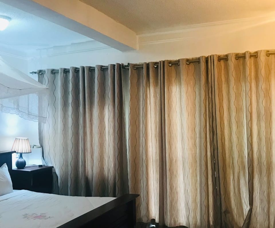 Desk, laptop workspace, free WiFi, bed sheets