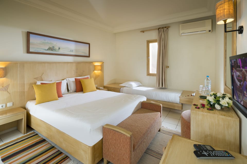 Minibar, desk, blackout drapes, bed sheets