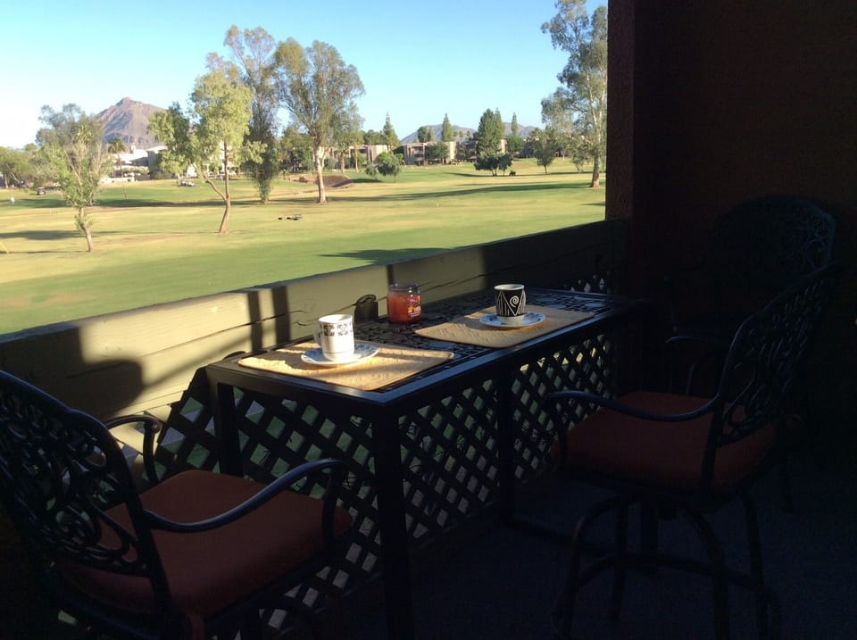 Balcony with mountain and golf course view