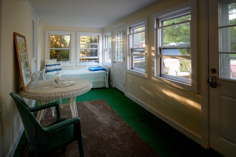 Sitting area in screened in porch