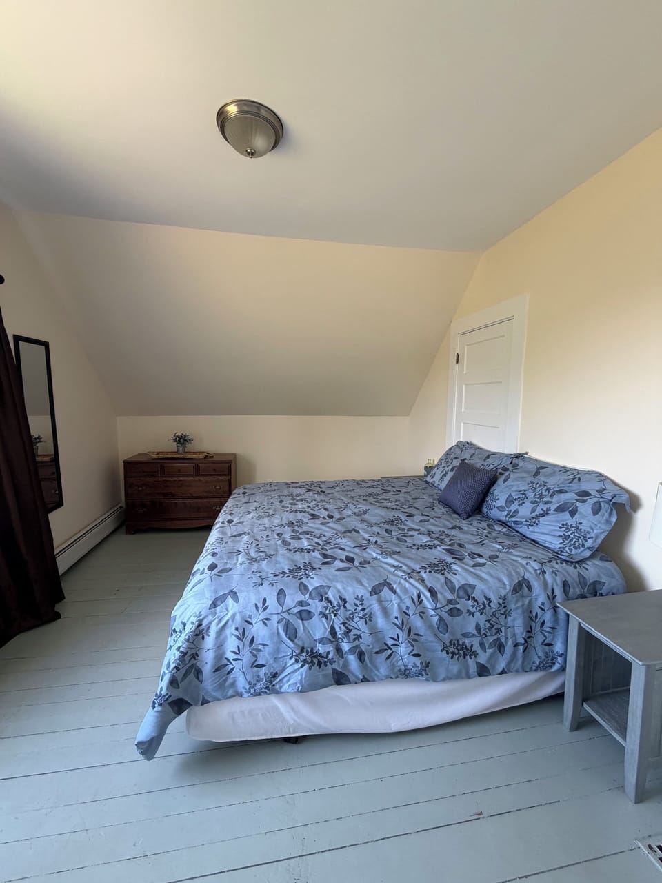 Upstairs primary bedroom. King size bed, dresser and closet for clothes! 