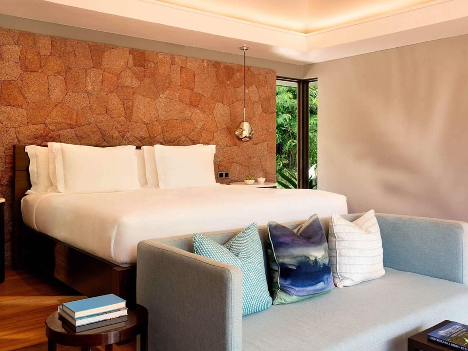 Premium bedding, down comforters, Tempur-Pedic beds, minibar
