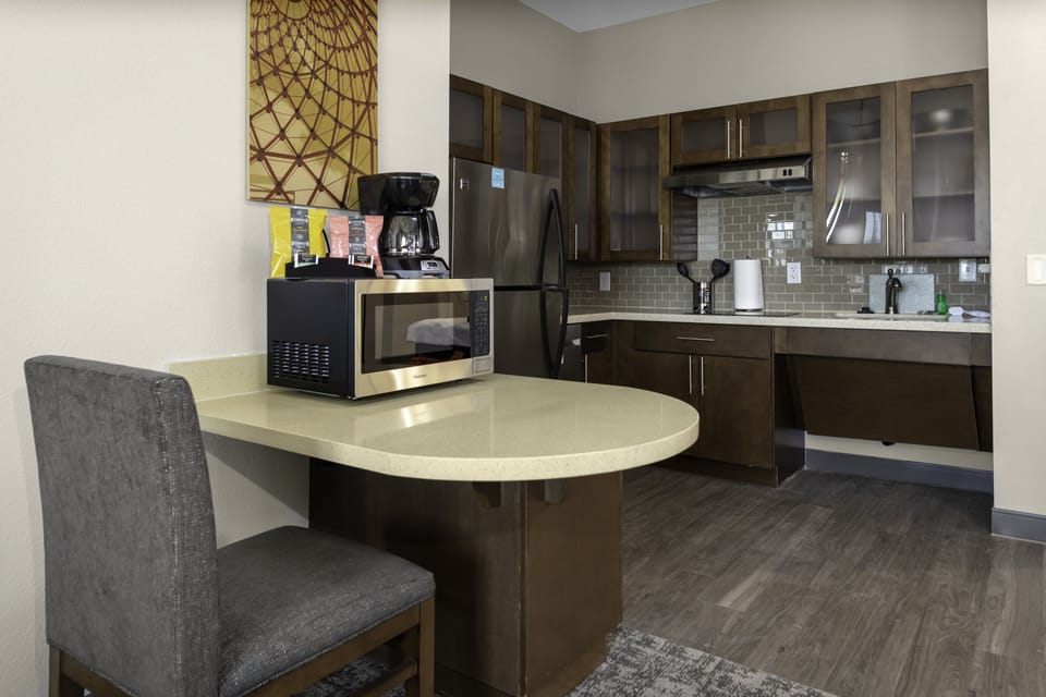 Desk, blackout drapes, iron/ironing board, free cribs/infant beds