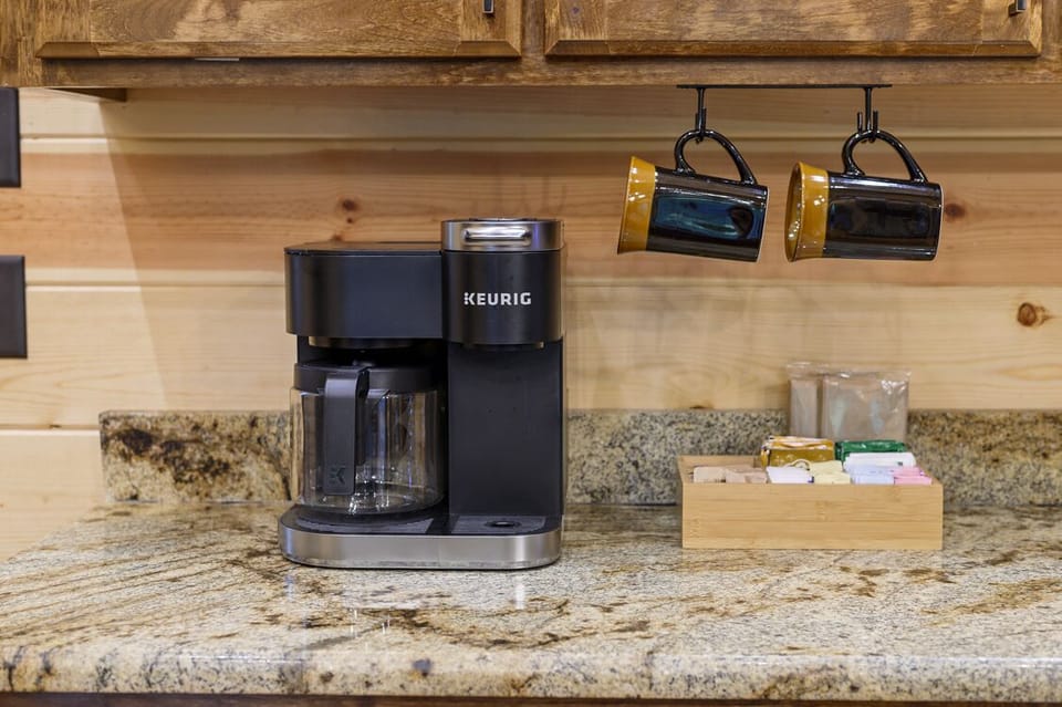 Dual Keurig coffee maker.  Coffee grounds not provided.