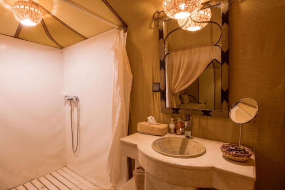 Shower, free toiletries, slippers, towels