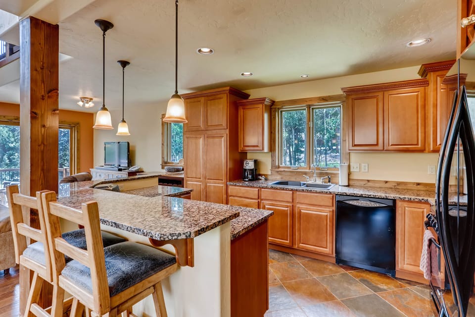 The kitchen has all utensils, dishes, pots and pans and cook ware. You won't need a thing except groceries.