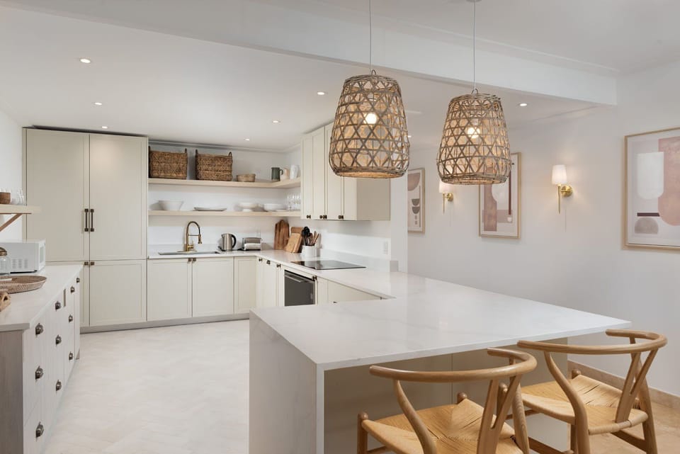 State-of-the-art stainless steel appliances and a large breakfast bar for casual meals