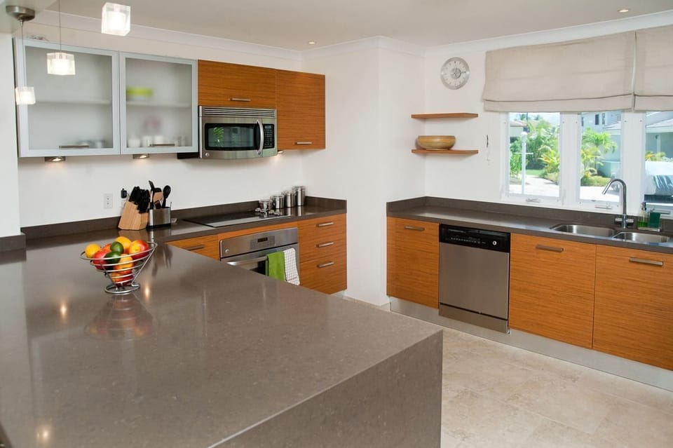 Modern kitchen equipped with stainless steel appliances
