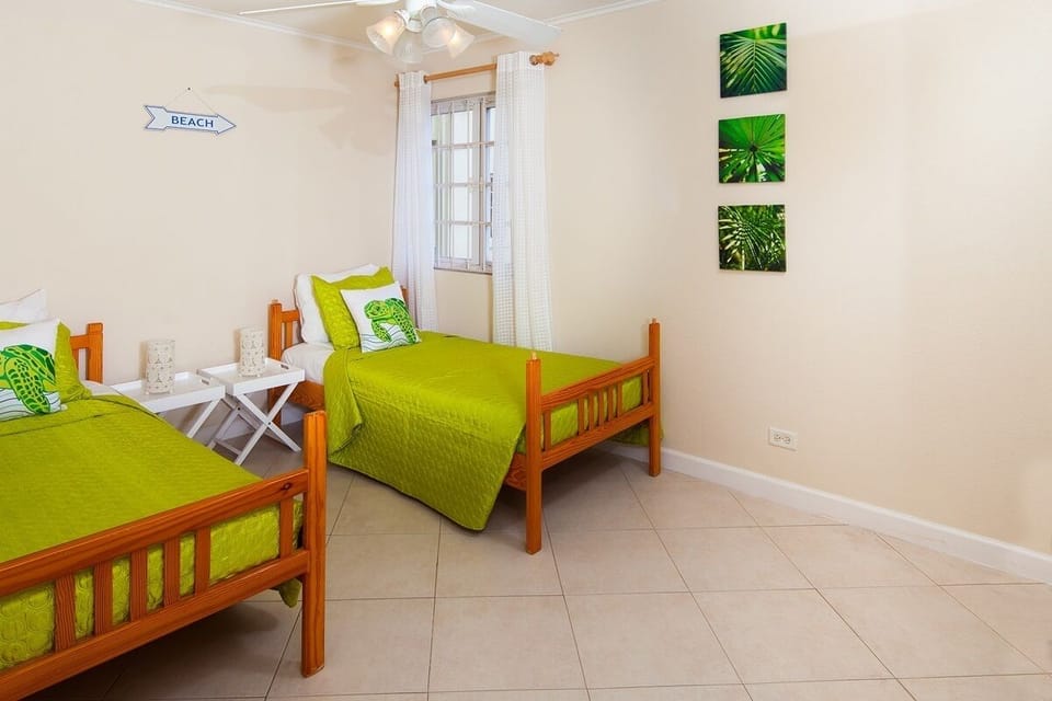 The third bedroom on ground level has two twin beds and A/C