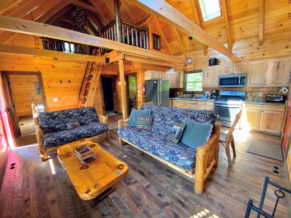 New couches have been added but picture kept to show access to loft.
