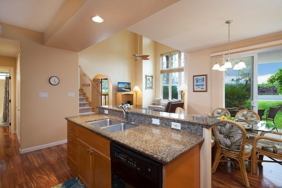 View from kitchen island to living and dining areas.