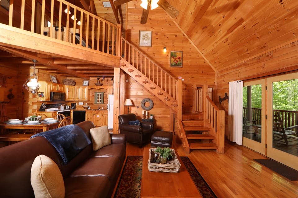 Living Room with Wood Burning Fireplace and a Sleeper Sofa